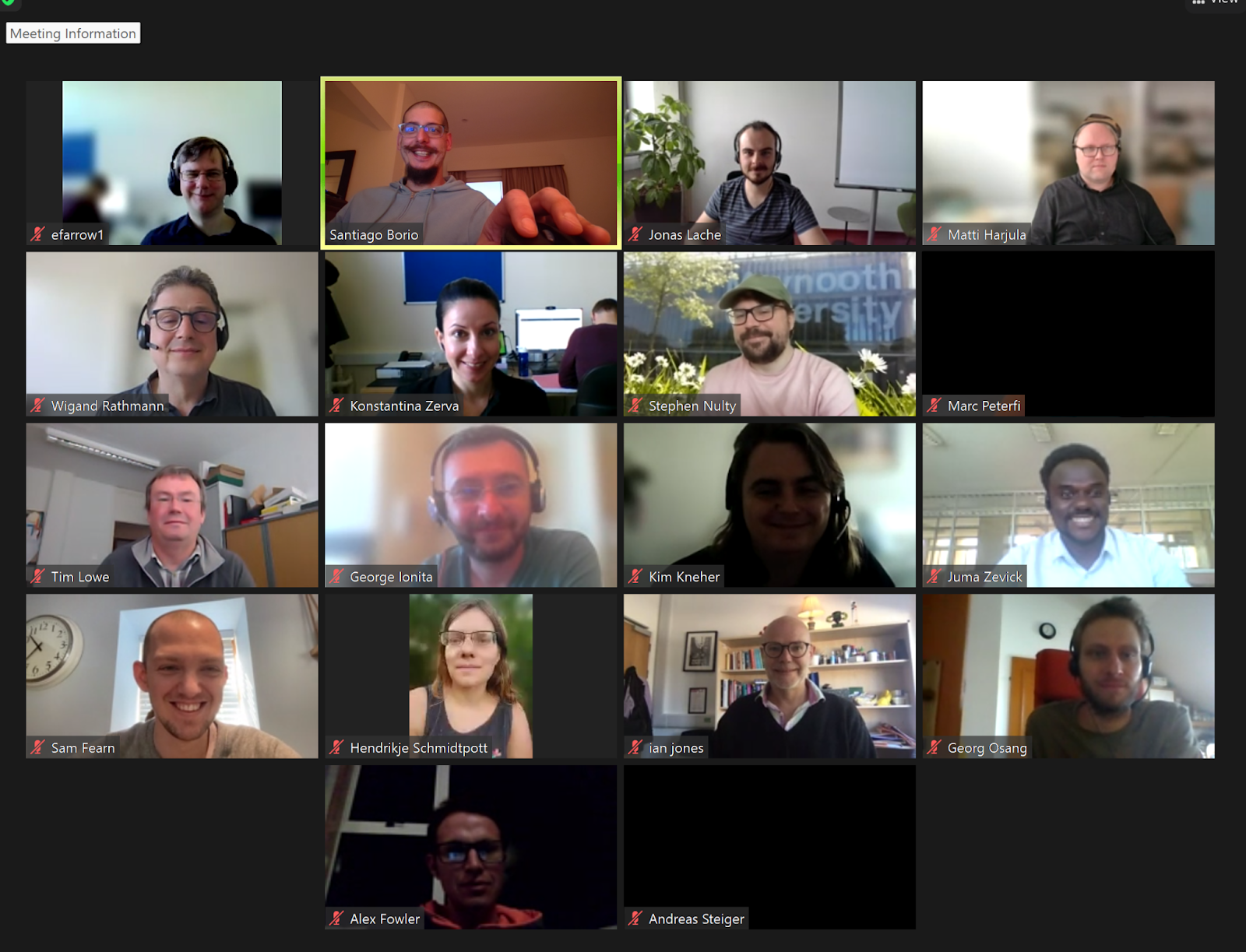 Network members in discussion during a meeting